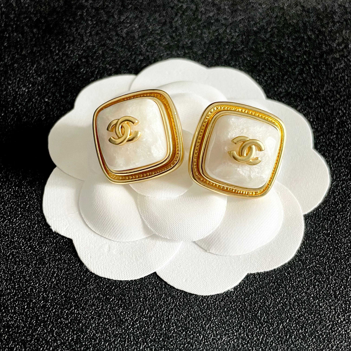 Double-C Emblem Stud Earrings in Polished Metal-Tone – Design 217 front product view