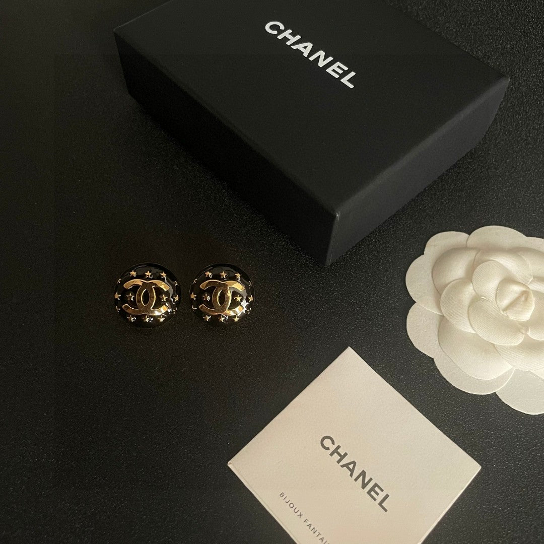 Double-C Emblem Stud Earrings in Polished Metal-Tone – Star Detail – Design 014 close-up detail
