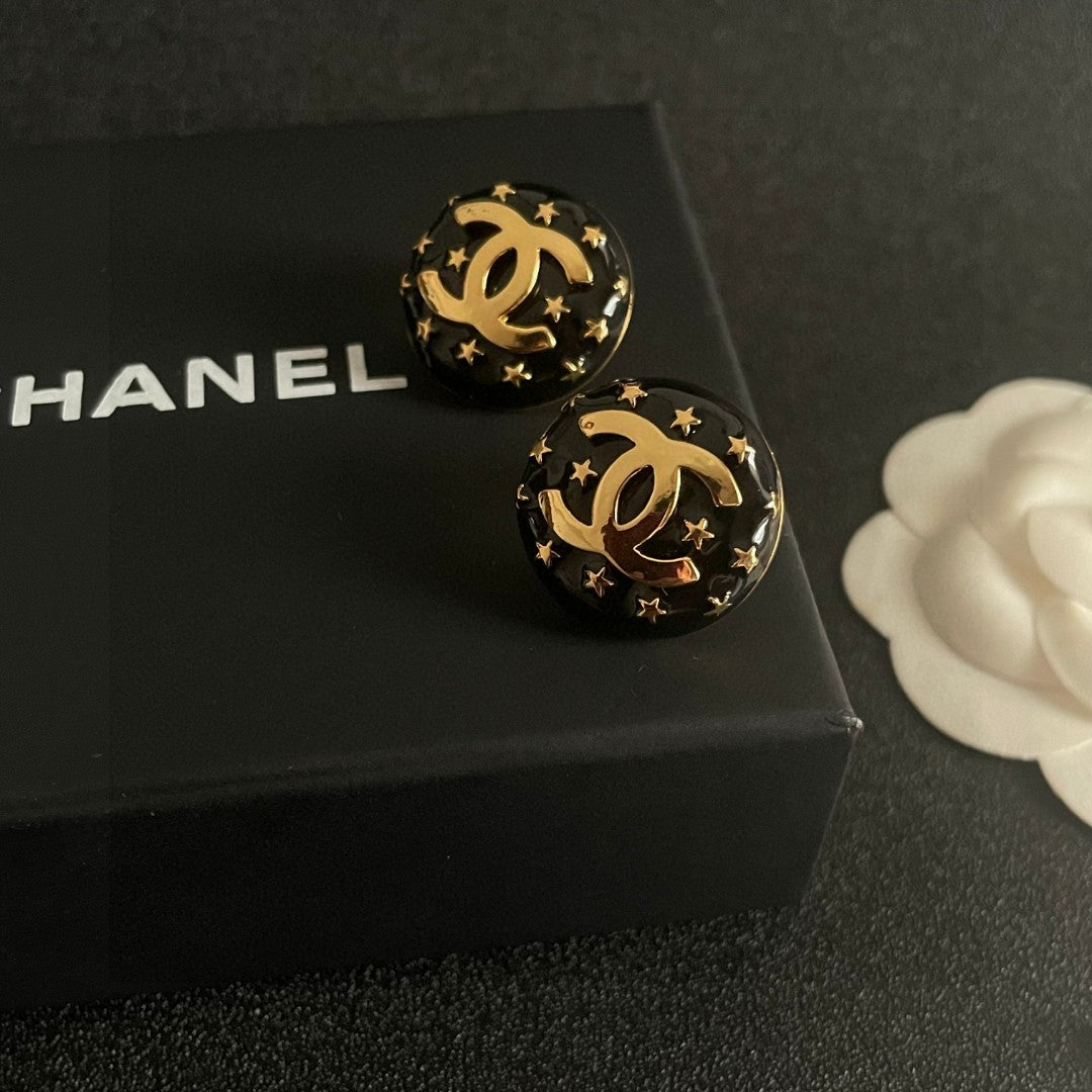Double-C Emblem Stud Earrings in Polished Metal-Tone – Star Detail – Design 014 detail view