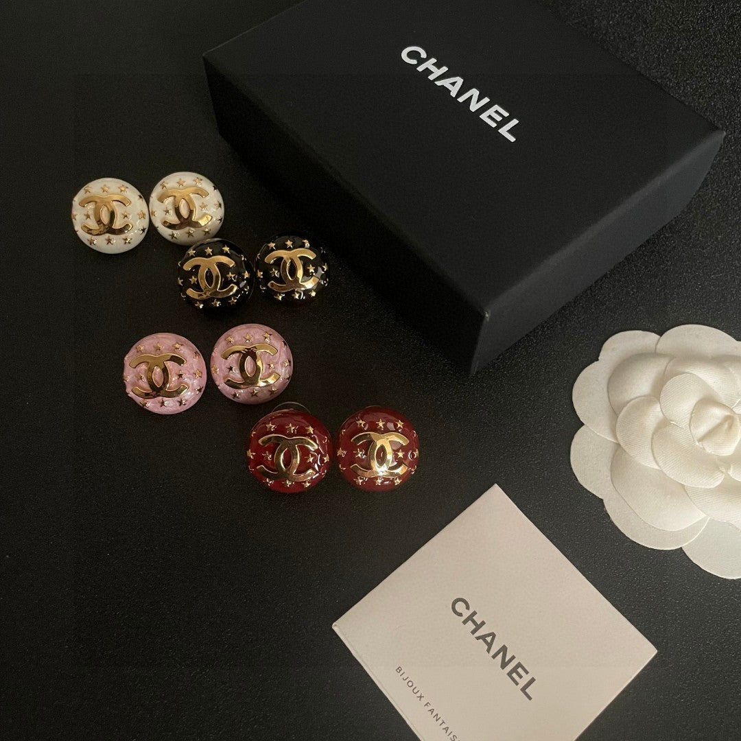 Double-C Emblem Stud Earrings in Polished Metal-Tone – Star Detail – Design 014 side detail