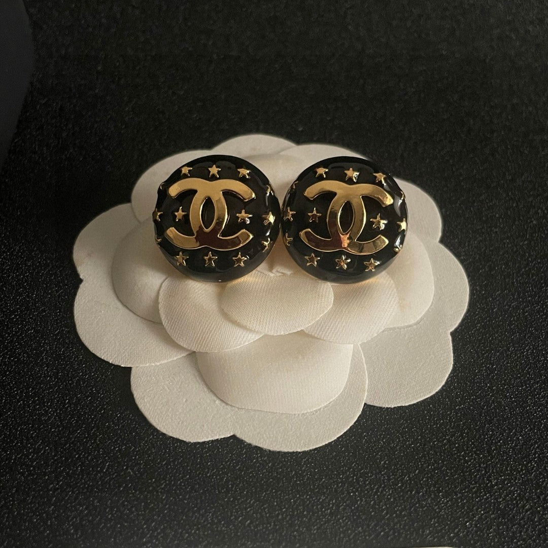 Double-C Emblem Stud Earrings in Polished Metal-Tone – Star Detail – Design 018 front product view
