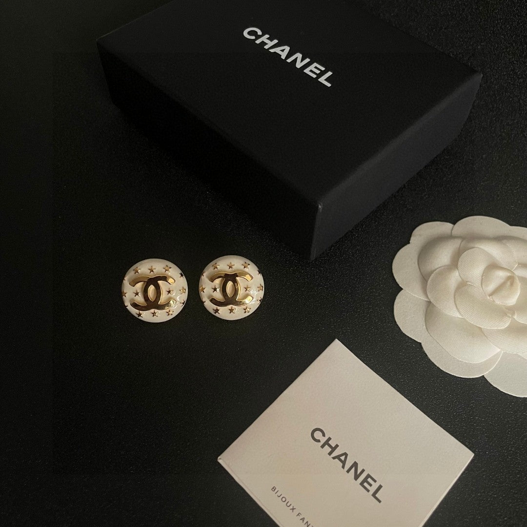 Double-C Emblem Stud Earrings in Polished Metal-Tone – Star Detail – Design 013 close-up detail