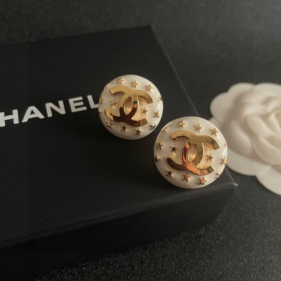 Double-C Emblem Stud Earrings in Polished Metal-Tone – Star Detail – Design 013 detail view