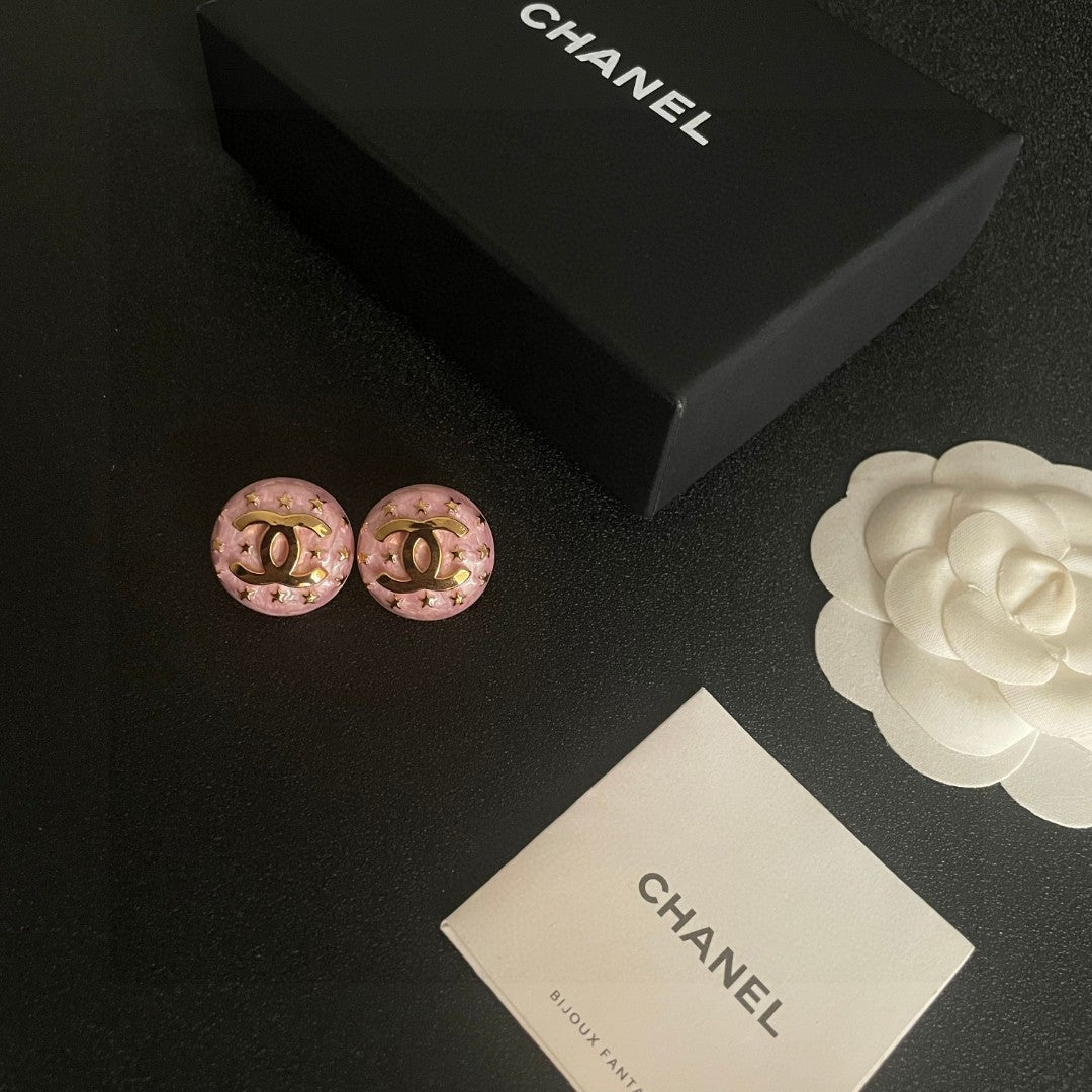 Double-C Emblem Stud Earrings in Polished Metal-Tone – Star Detail – Design 016 close-up detail