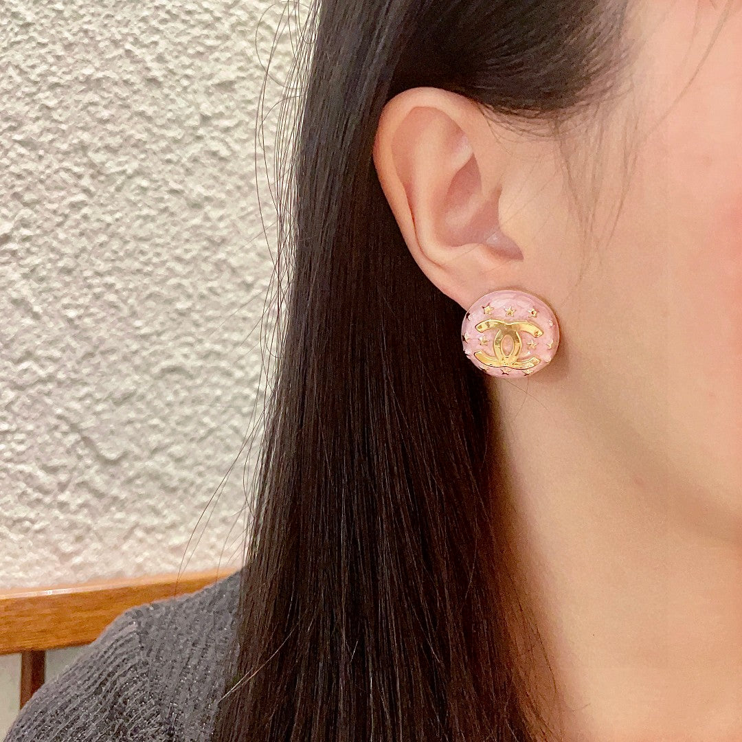 Double-C Emblem Stud Earrings in Polished Metal-Tone – Star Detail – Design 016 detail view