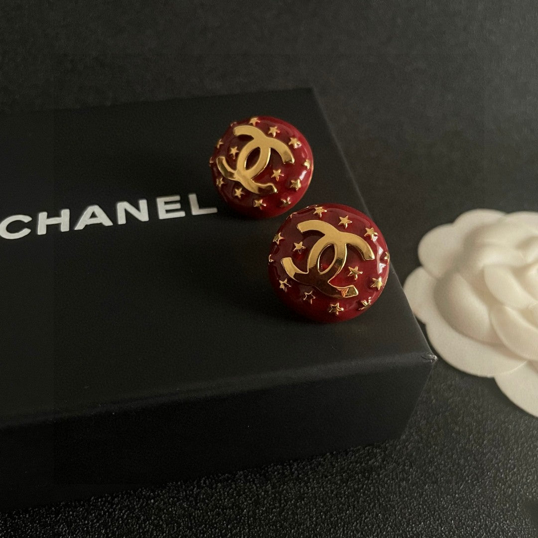 Double-C Emblem Stud Earrings in Polished Metal-Tone – Star Detail – Design 011 detail view