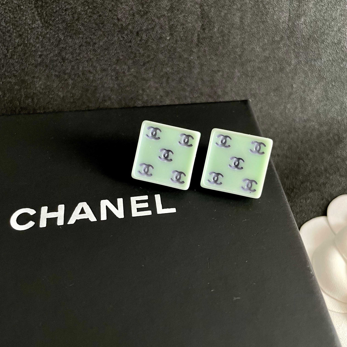 Double-C Emblem Stud Earrings in Polished Metal-Tone – Design 230 detail view