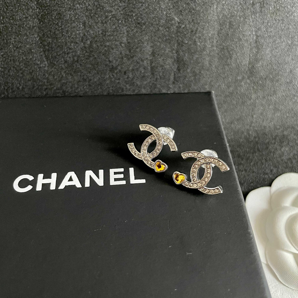 Signature Emblem Stud Earrings in Polished Metal-Tone – Design 053 detail view