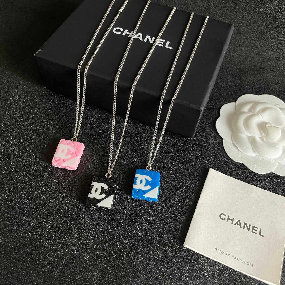 Double-C Emblem Pendant Necklace in Polished Metal-Tone – Design 040 close-up detail