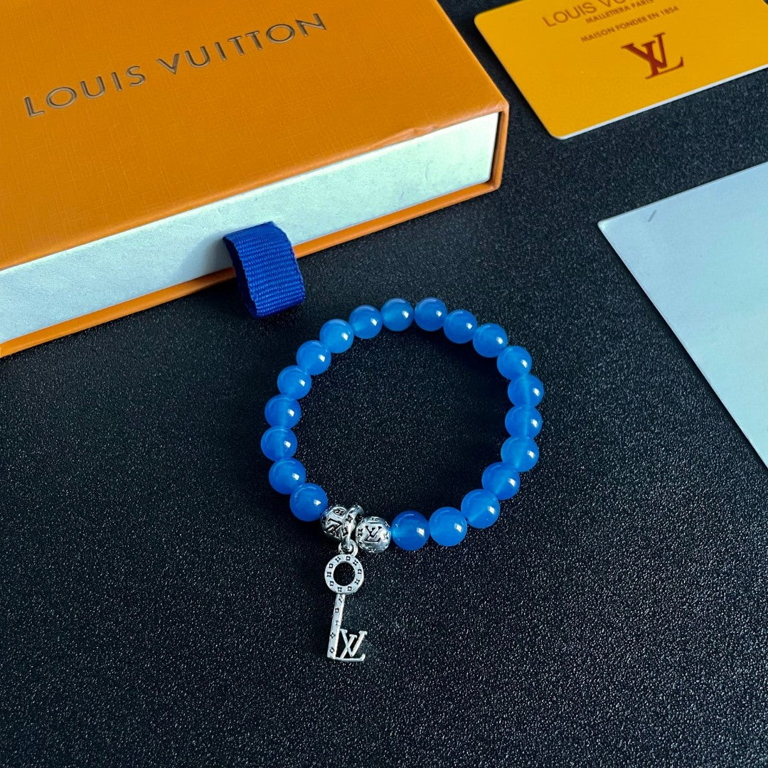 Letter Emblem Bracelet in Polished Metal-Tone – Pearl Detail – Design 002 styled product view