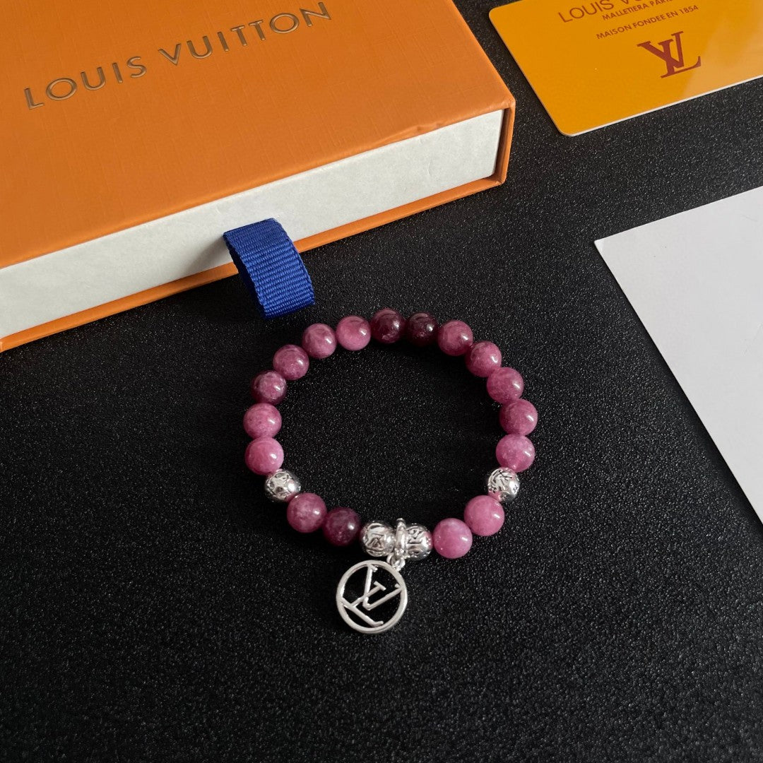 Letter Emblem Bracelet in Polished Metal-Tone – Pearl Detail styled product view
