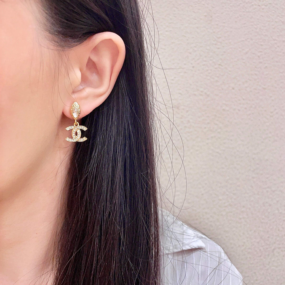 Signature Emblem Stud Earrings in Polished Metal-Tone – Design 043 detail view