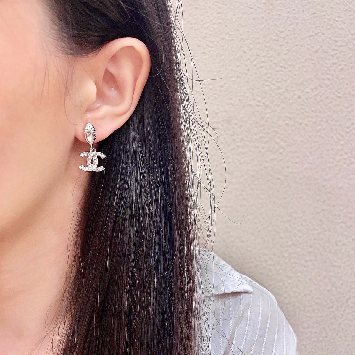 Signature Emblem Stud Earrings in Polished Metal-Tone – Design 042 detail view