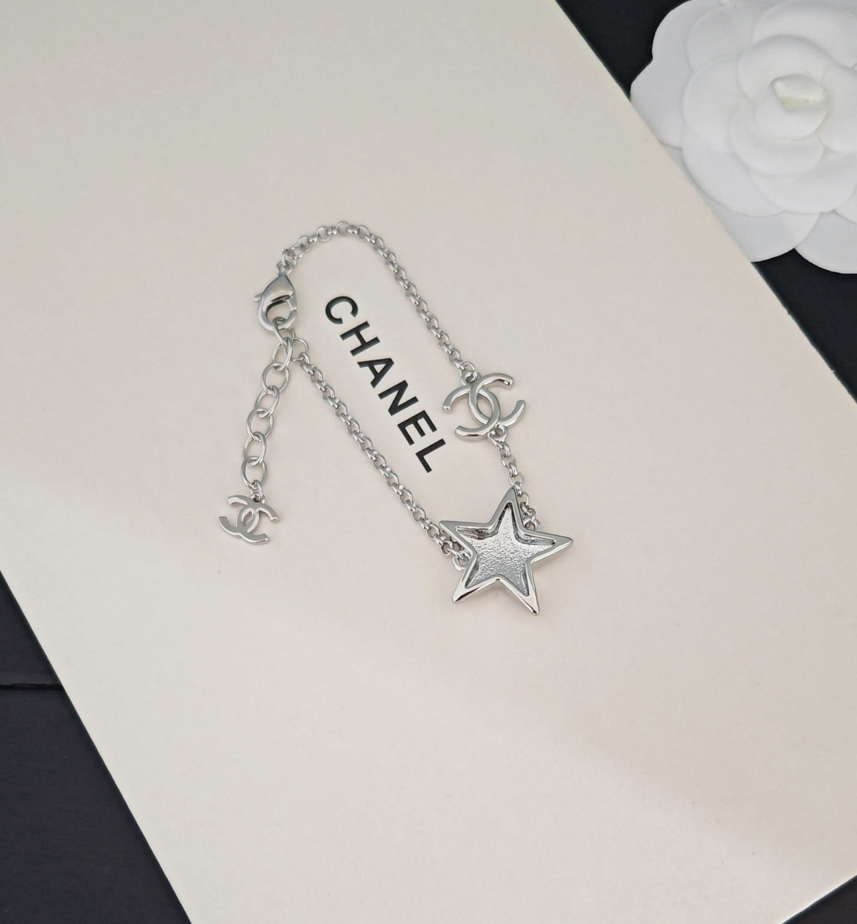 Signature Emblem Bracelet in Gold-Tone – White Detail front product view