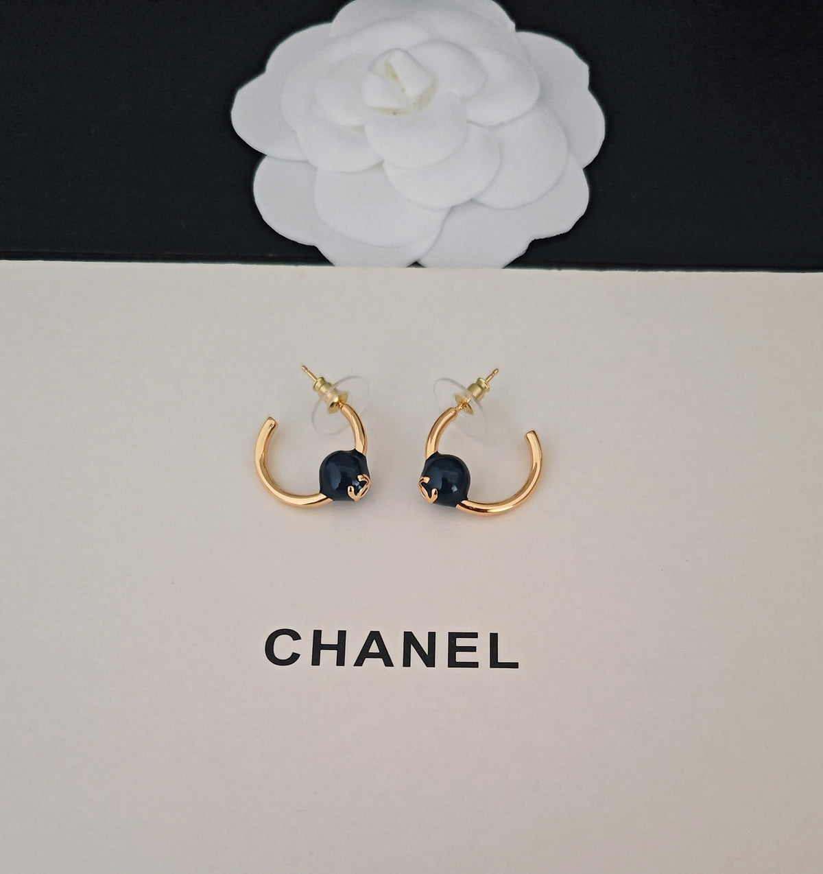Signature Emblem Jewelry Accessory in Gold-Tone – Blue Detail front product view