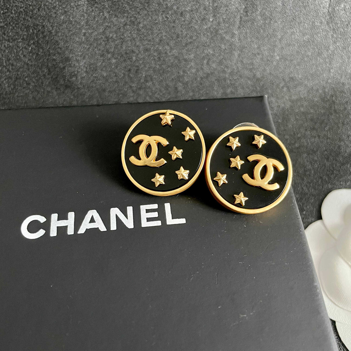 Double-C Emblem Stud Earrings in Polished Metal-Tone – Star Detail – Design 008 detail view