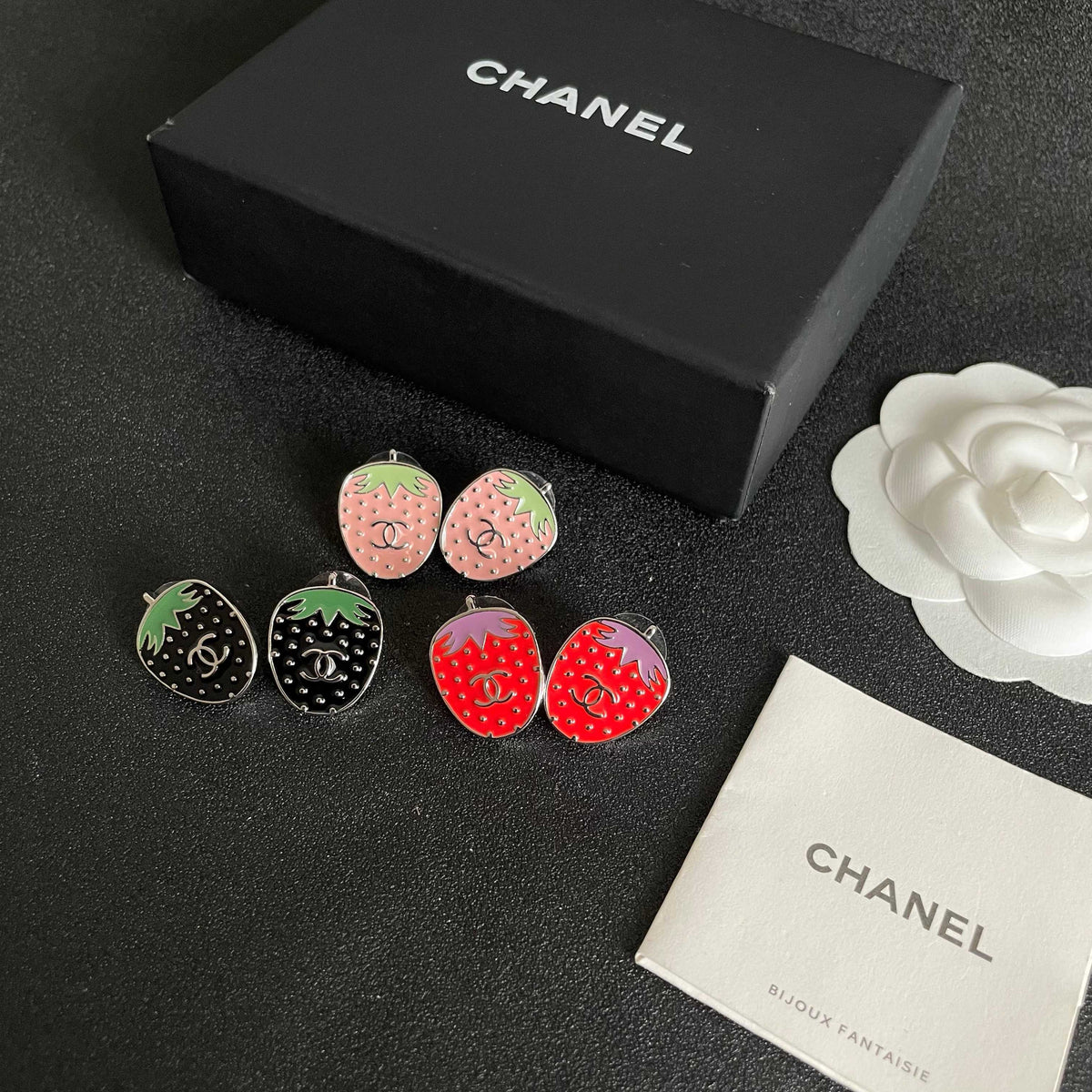 Double-C Emblem Stud Earrings in Polished Metal-Tone – Design 291 close-up detail