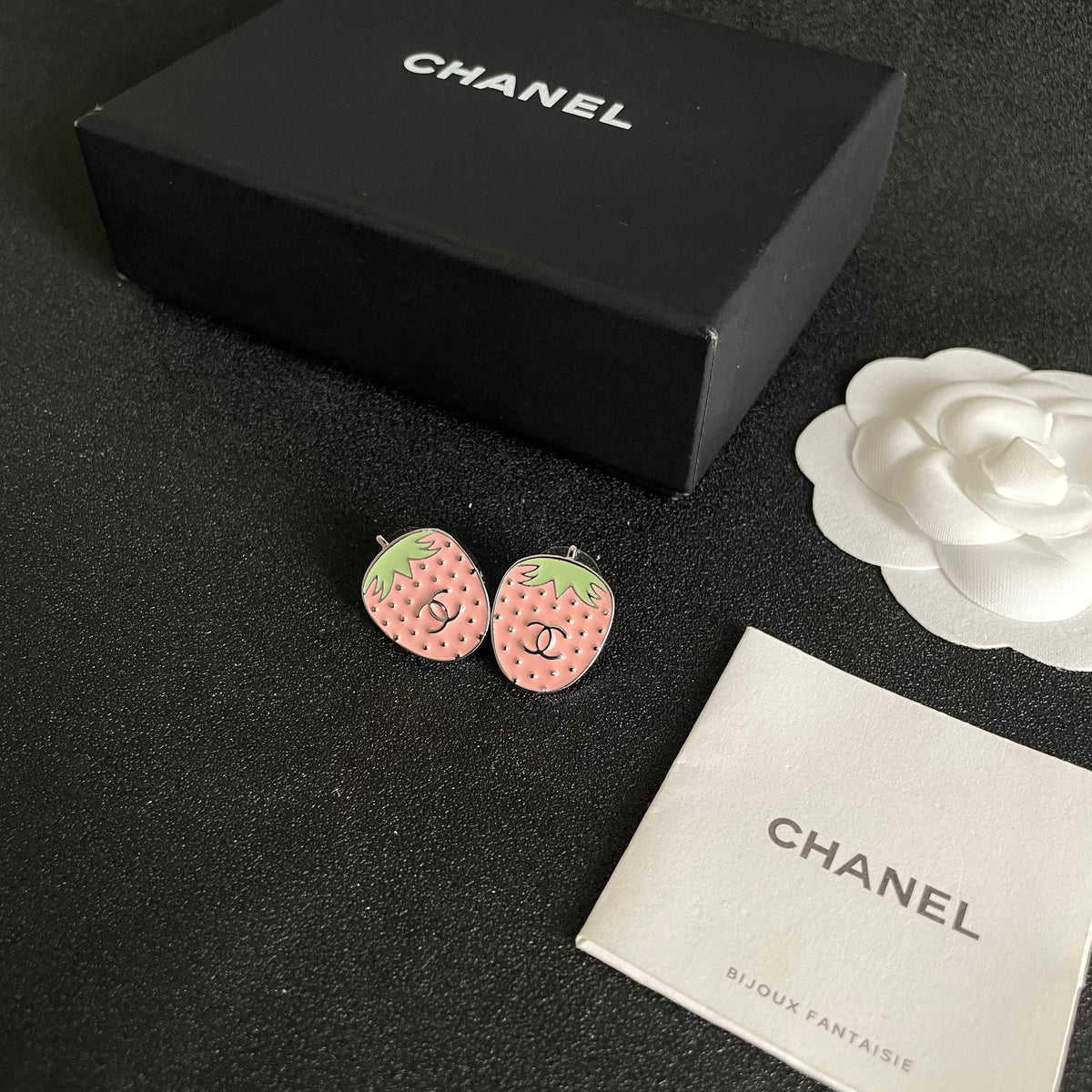 Double-C Emblem Stud Earrings in Polished Metal-Tone – Design 292 close-up detail