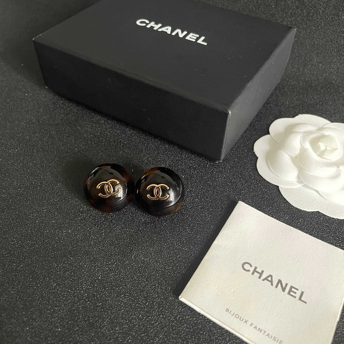 Double-C Emblem Stud Earrings in Polished Metal-Tone – Design 333 close-up detail