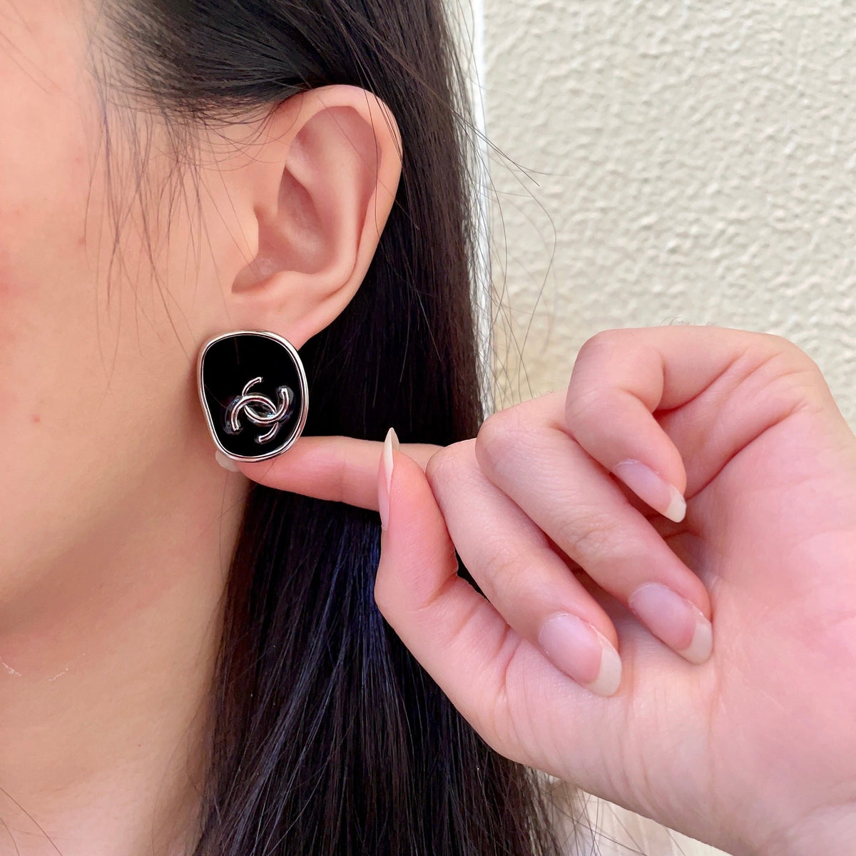 Double-C Emblem Stud Earrings in Polished Metal-Tone – Design 313 front product view