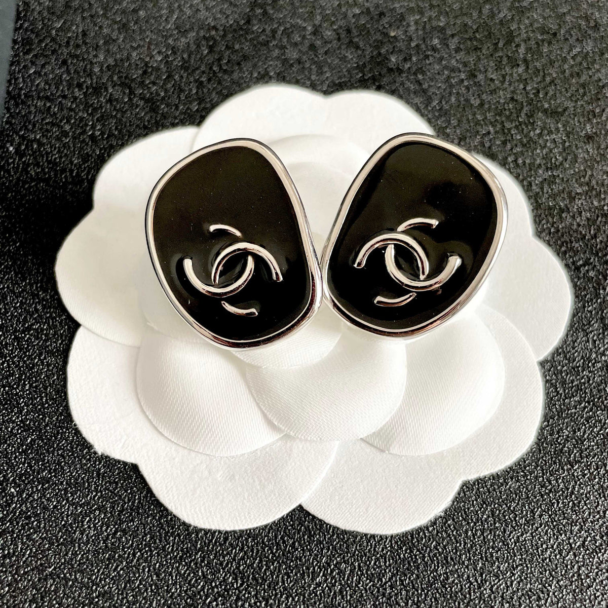 Double-C Emblem Stud Earrings in Polished Metal-Tone – Design 331 front product view