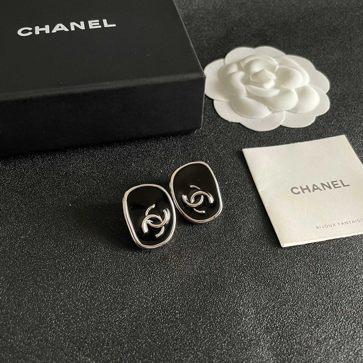 Double-C Emblem Stud Earrings in Polished Metal-Tone – Design 331 styled product view
