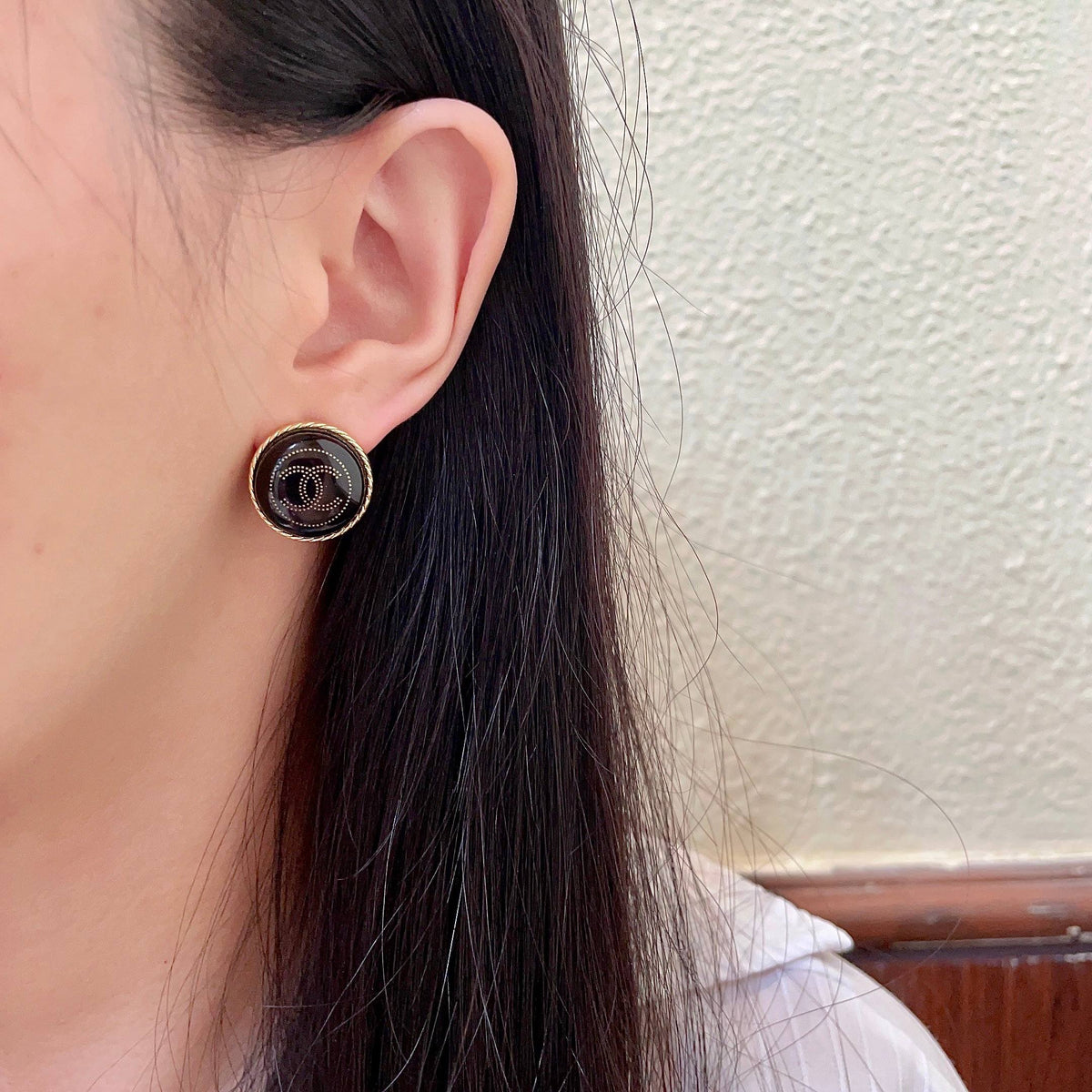 Double-C Emblem Stud Earrings in Polished Metal-Tone – Design 312 detail view
