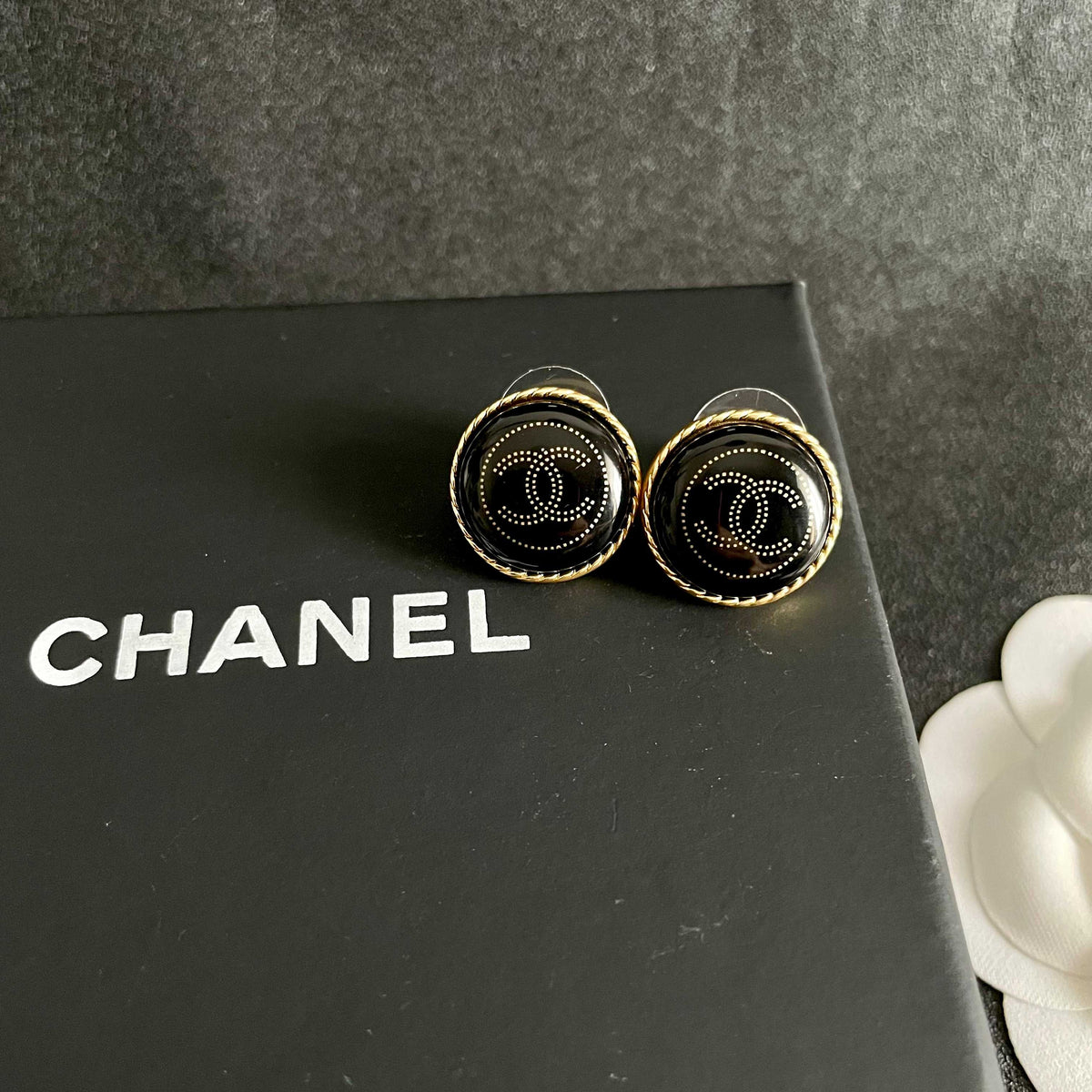 Double-C Emblem Stud Earrings in Polished Metal-Tone – Design 312 detail view