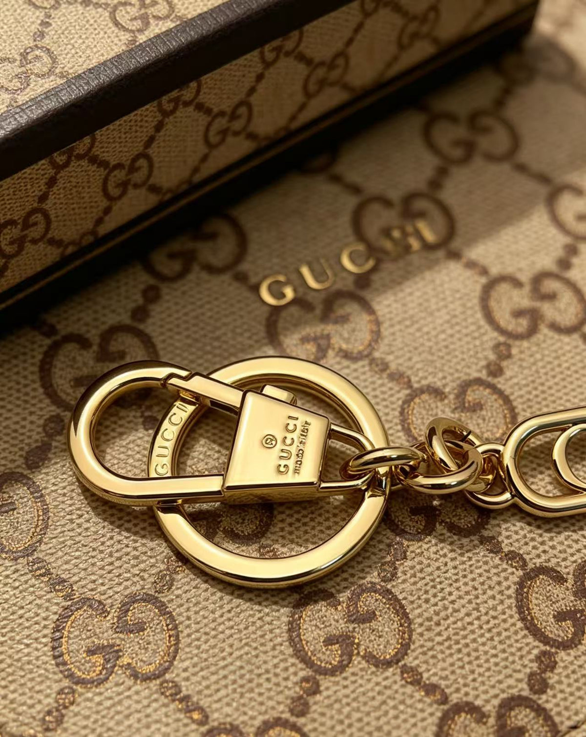 Letter Emblem Keychain in Polished Metal-Tone styled product view