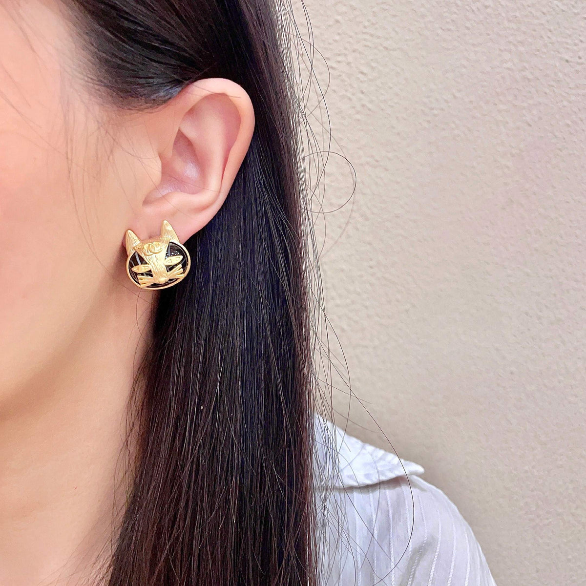 Signature Emblem Stud Earrings in Polished Metal-Tone – Design 076 detail view