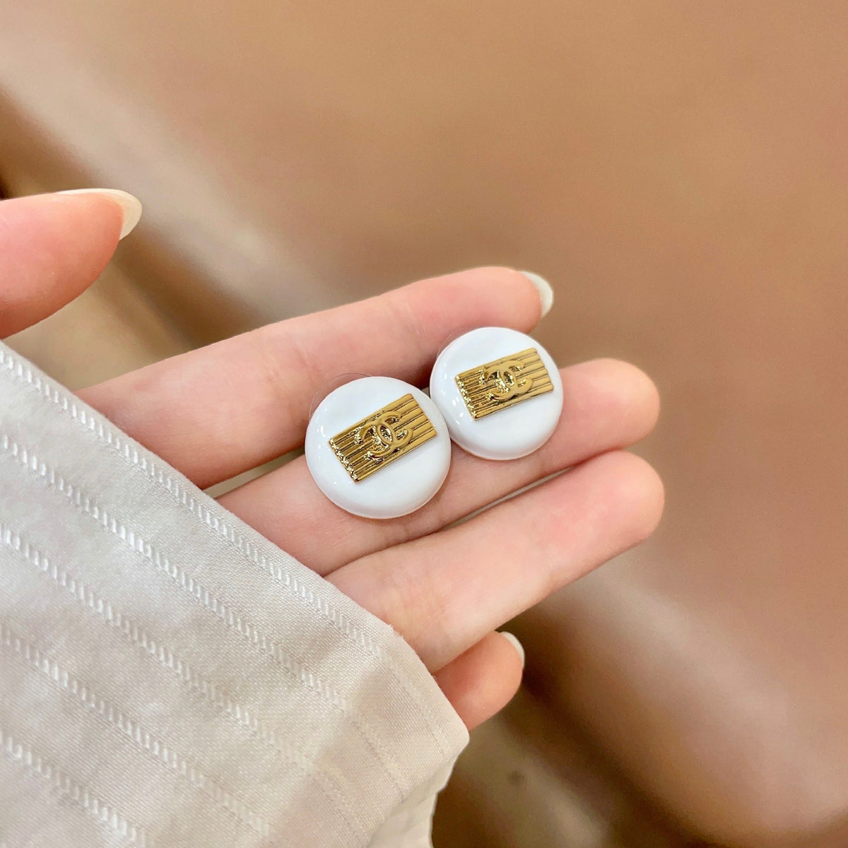 Signature Emblem Stud Earrings in Polished Metal-Tone – Design 073 side detail