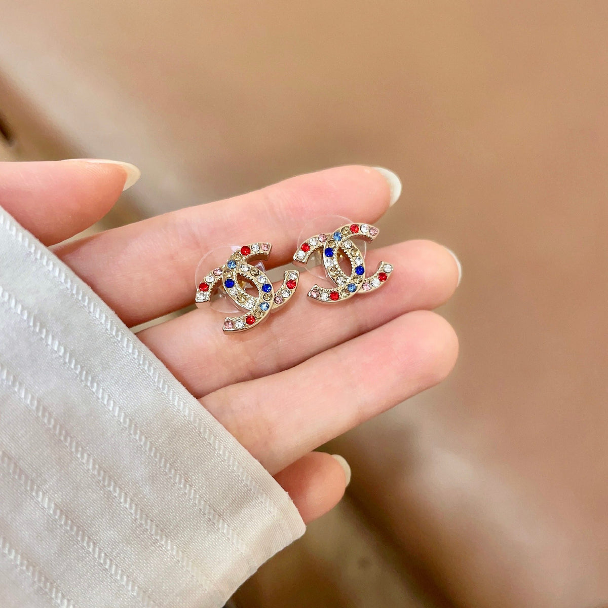 Signature Emblem Stud Earrings in Polished Metal-Tone – Design 070 side detail