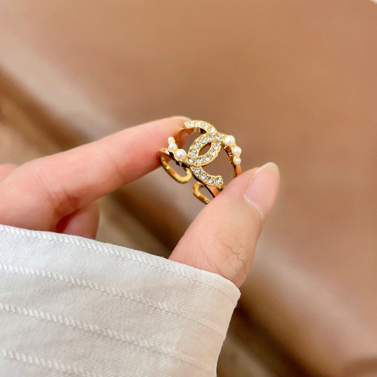 Double-C Emblem Statement Ring in Polished Metal-Tone – White Detail side detail