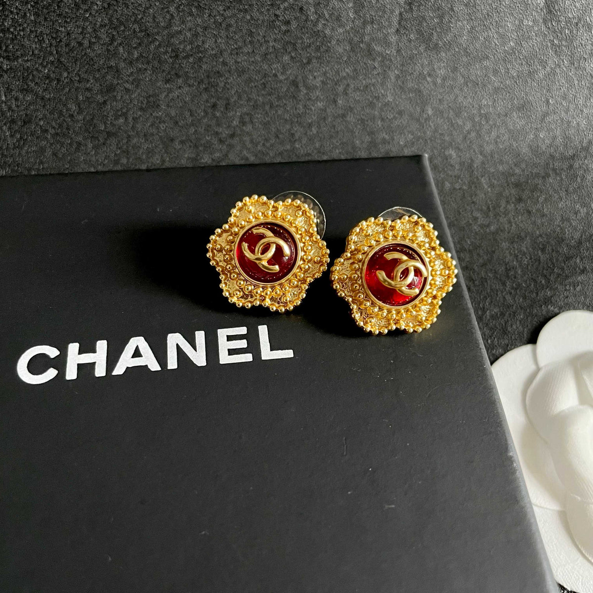 Double-C Emblem Stud Earrings in Polished Metal-Tone – Design 339 detail view