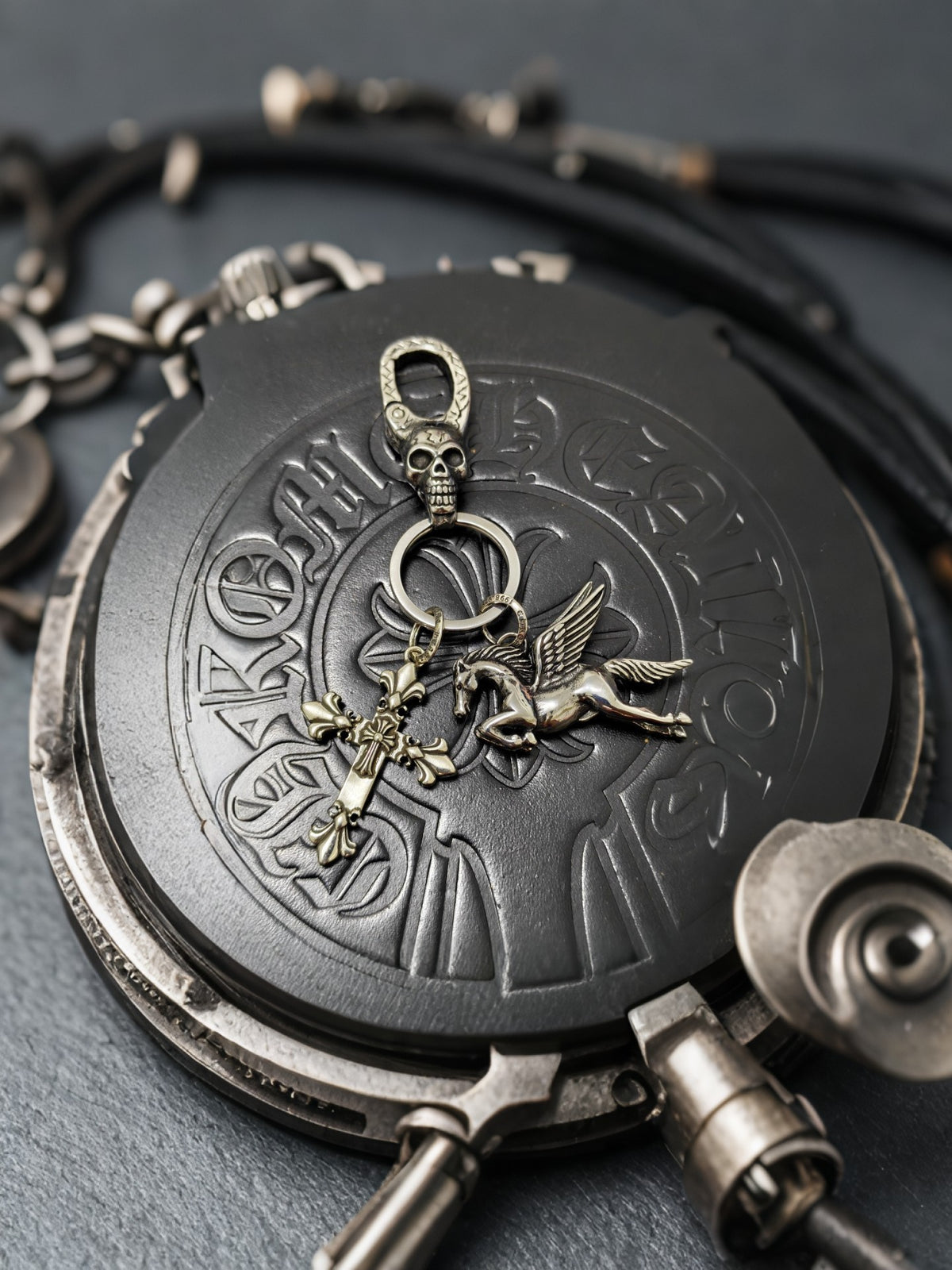 Signature Emblem Jewelry Accessory in Polished Metal-Tone – Black Detail – Design 002 close-up detail