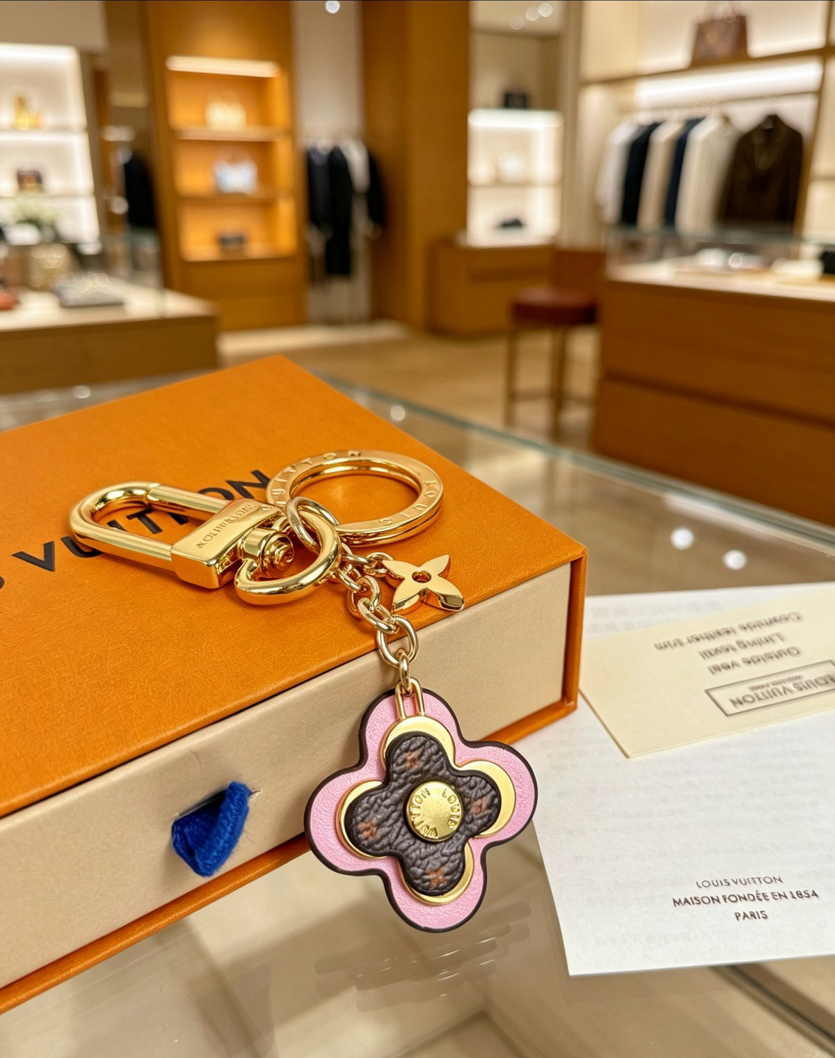 Signature Emblem Jewelry Accessory in Gold-Tone – Pink Detail detail view