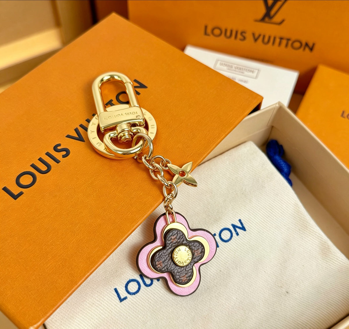 Signature Emblem Jewelry Accessory in Gold-Tone – Pink Detail main product view