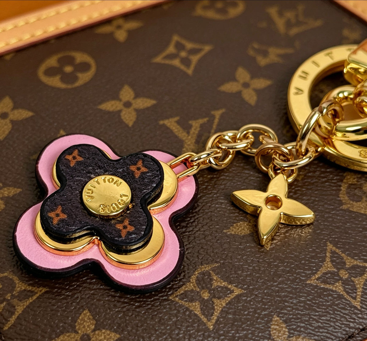 Signature Emblem Jewelry Accessory in Gold-Tone – Pink Detail styled product view