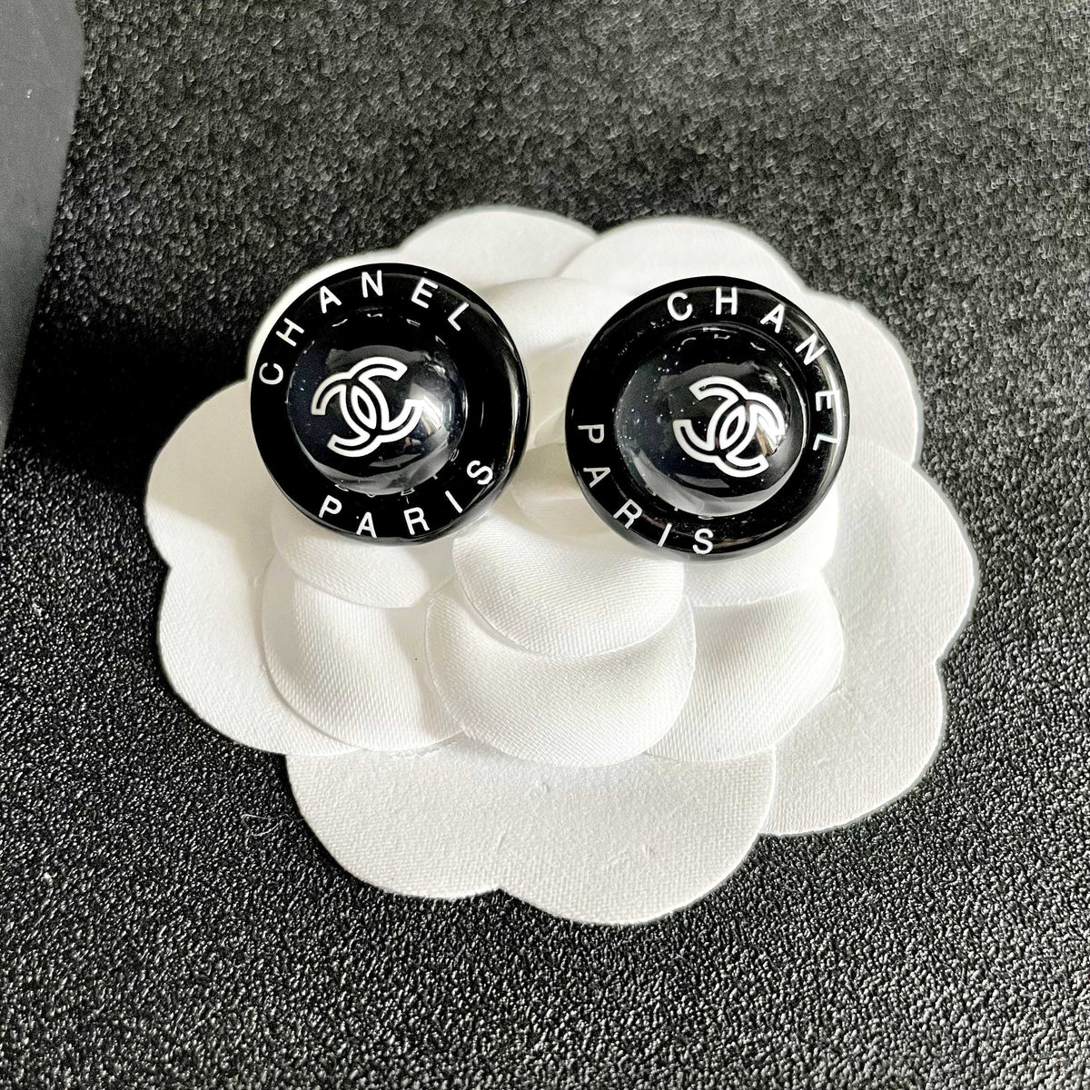 Double-C Emblem Stud Earrings in Polished Metal-Tone – Design 174 front product view