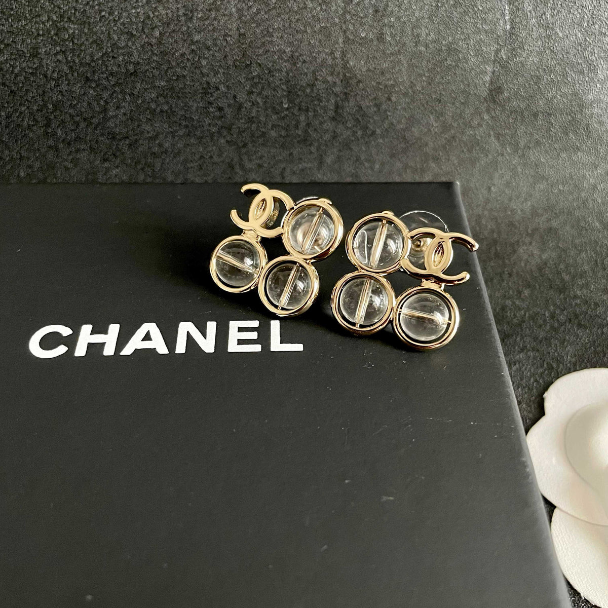 Double-C Emblem Stud Earrings in Polished Metal-Tone – Design 183 detail view
