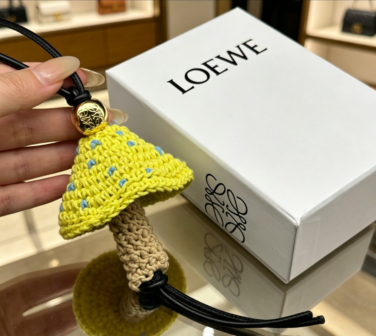 Sculptural Bag Charm in Gold-Tone with Leather Detail – Design 01 main product view