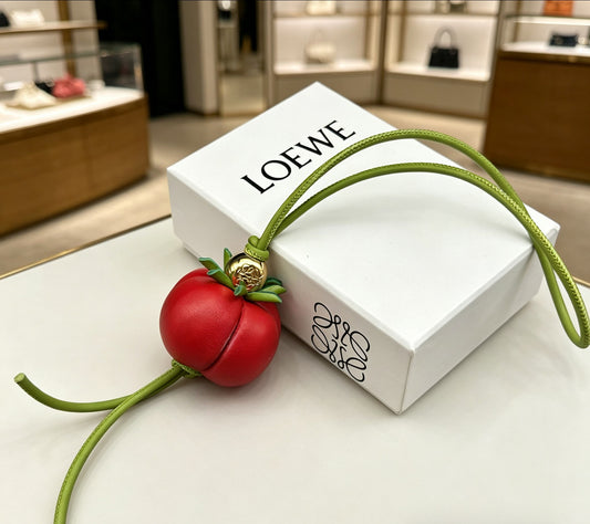 Graphic Emblem Bag Charm in Polished Metal-Tone with Leather Detail – Design 03 main product view