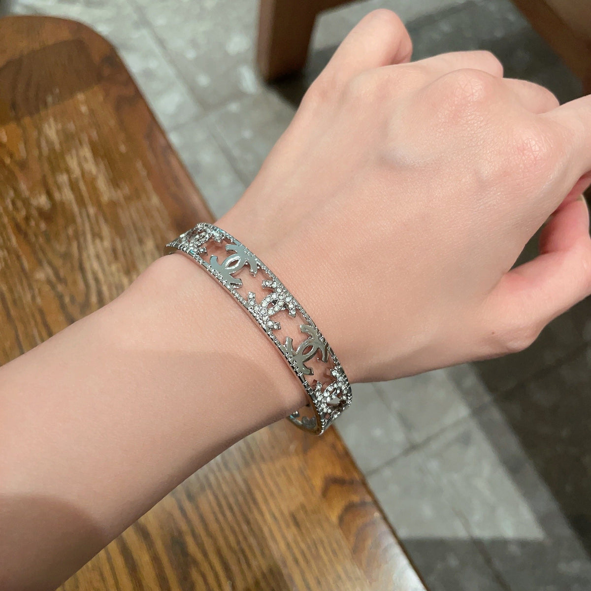 Letter Bangle in Polished Metal-Tone – Red Detail front product view