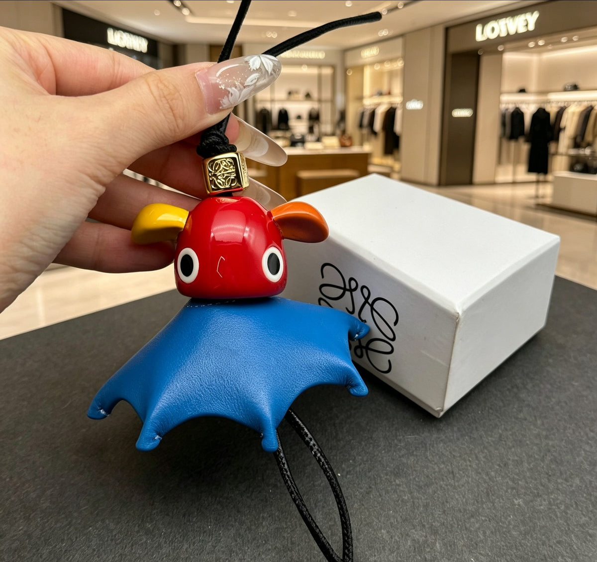 Elephant Motif Bag Charm in Polished Metal-Tone with Leather Detail – Design 06 front view