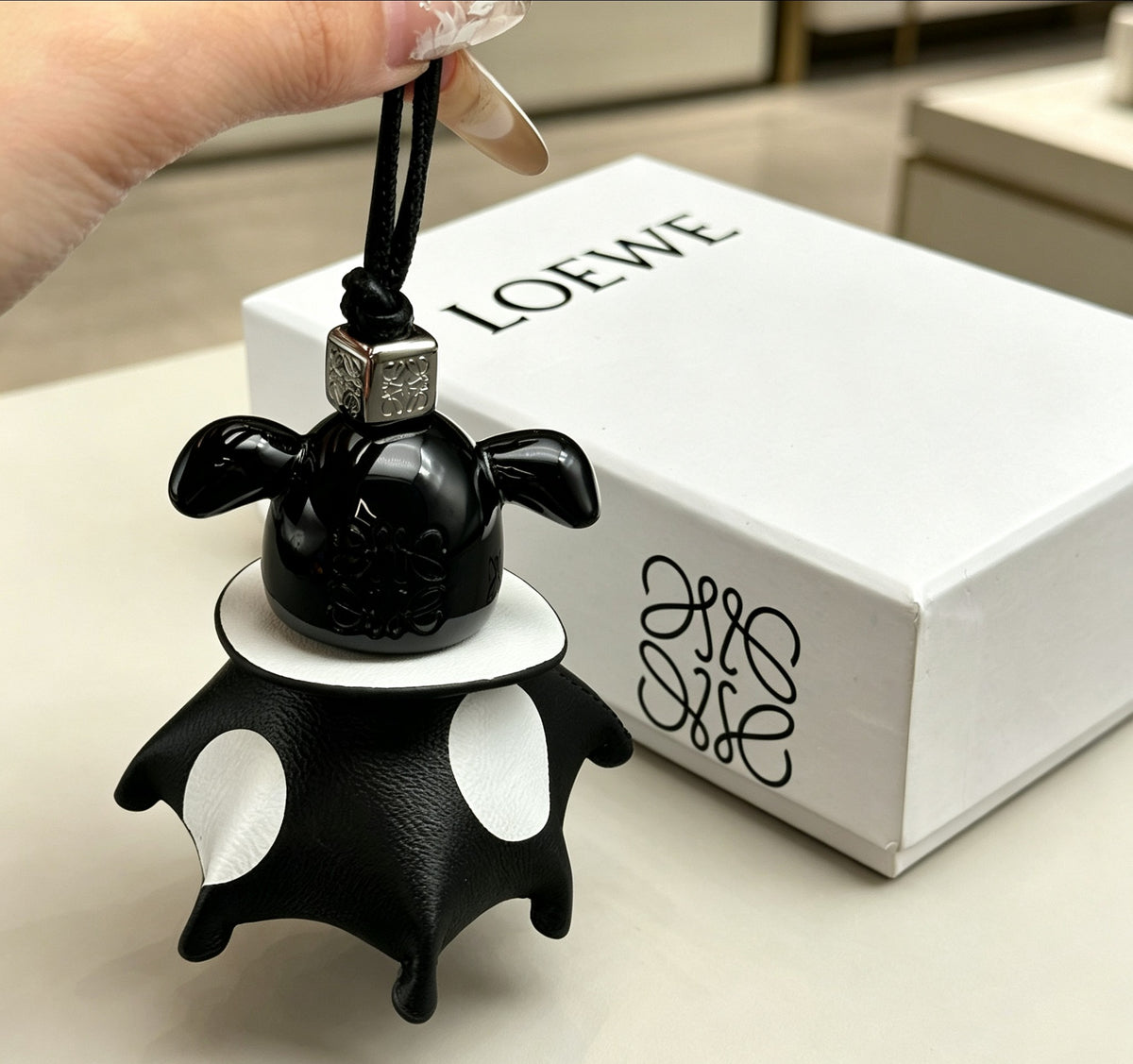 Elephant Motif Bag Charm in Polished Metal-Tone with Leather Detail – Design 05 styled view