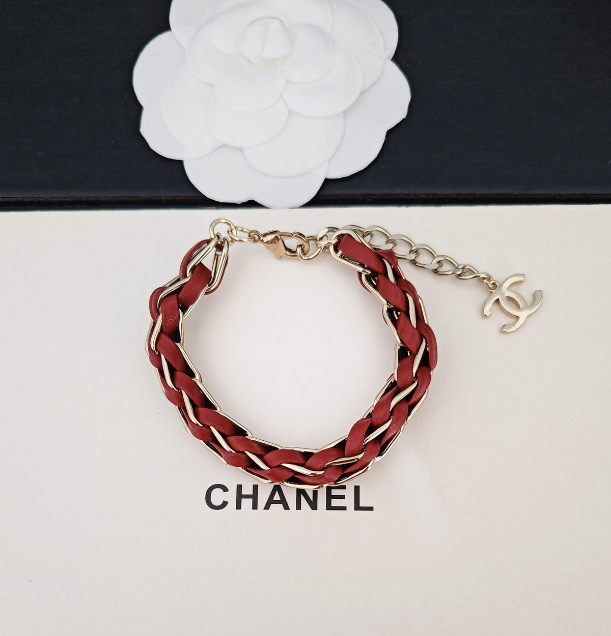 Signature Emblem Bracelet in Gold-Tone – Red Detail detail view