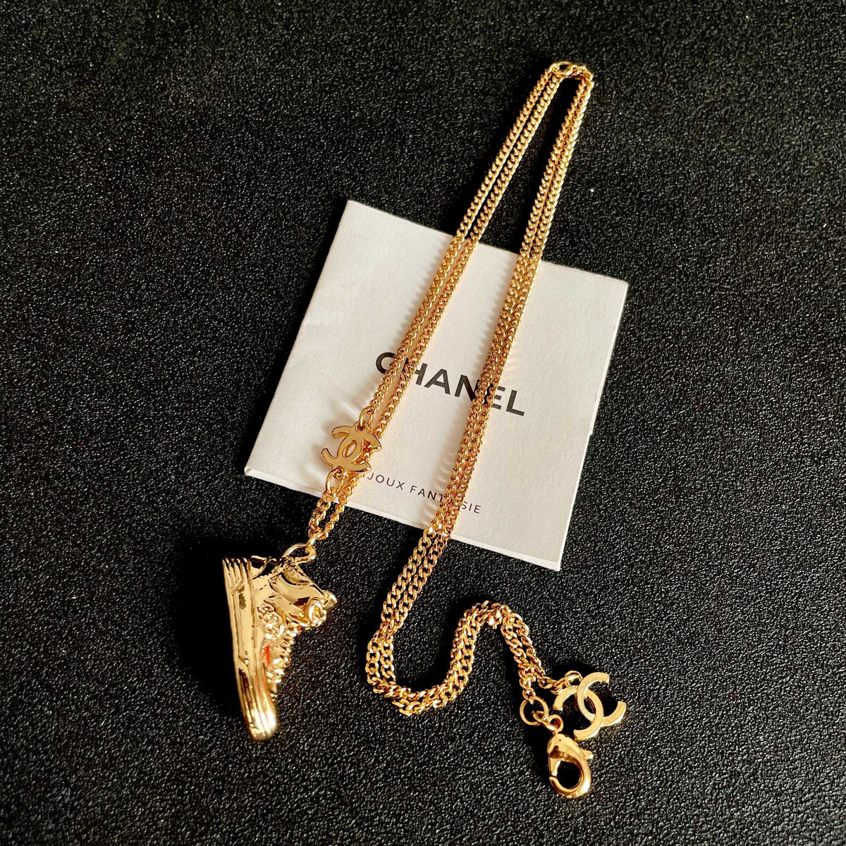 Signature Emblem Pendant Necklace in Polished Metal-Tone – Design 101 detail view