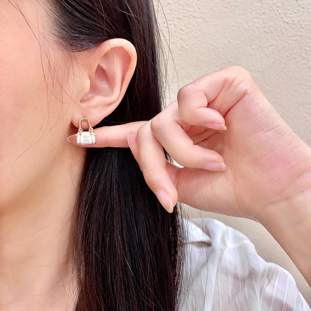 Signature Emblem Stud Earrings in Polished Metal-Tone – Design 103 front product view