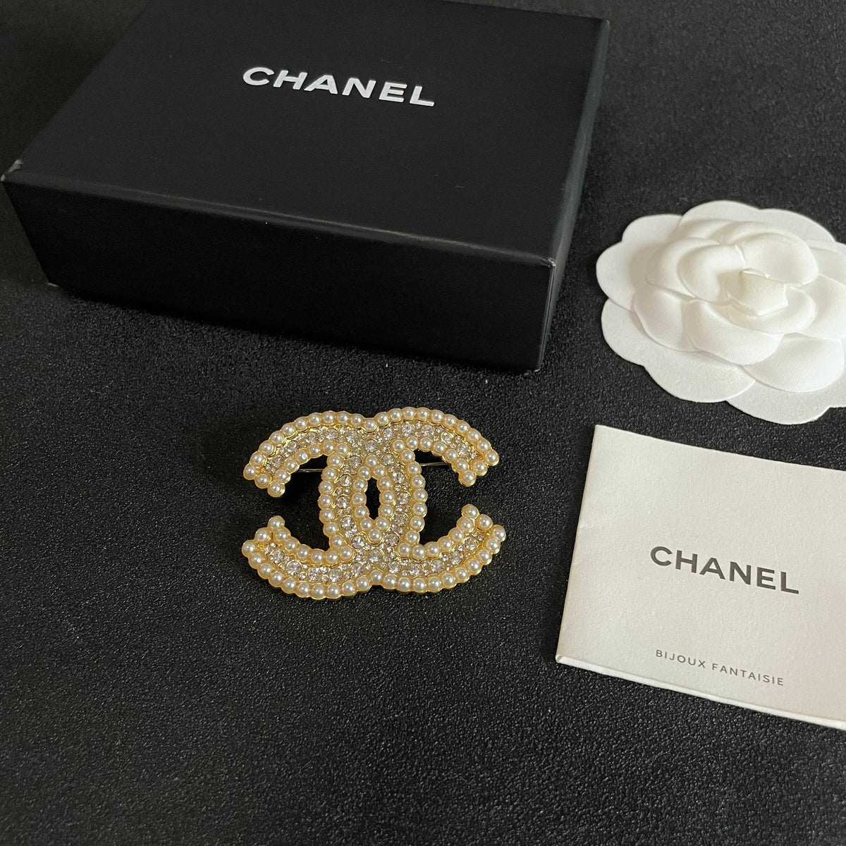 Signature Emblem Brooch in Polished Metal-Tone – Design 050 close-up detail