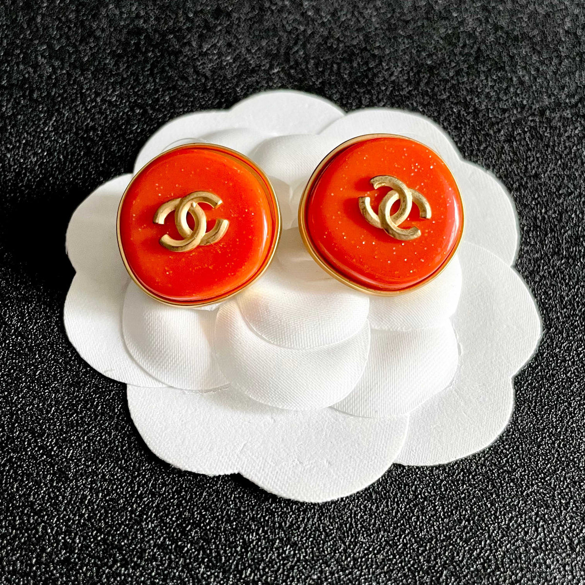 Double-C Emblem Stud Earrings in Polished Metal-Tone – Design 305 front product view